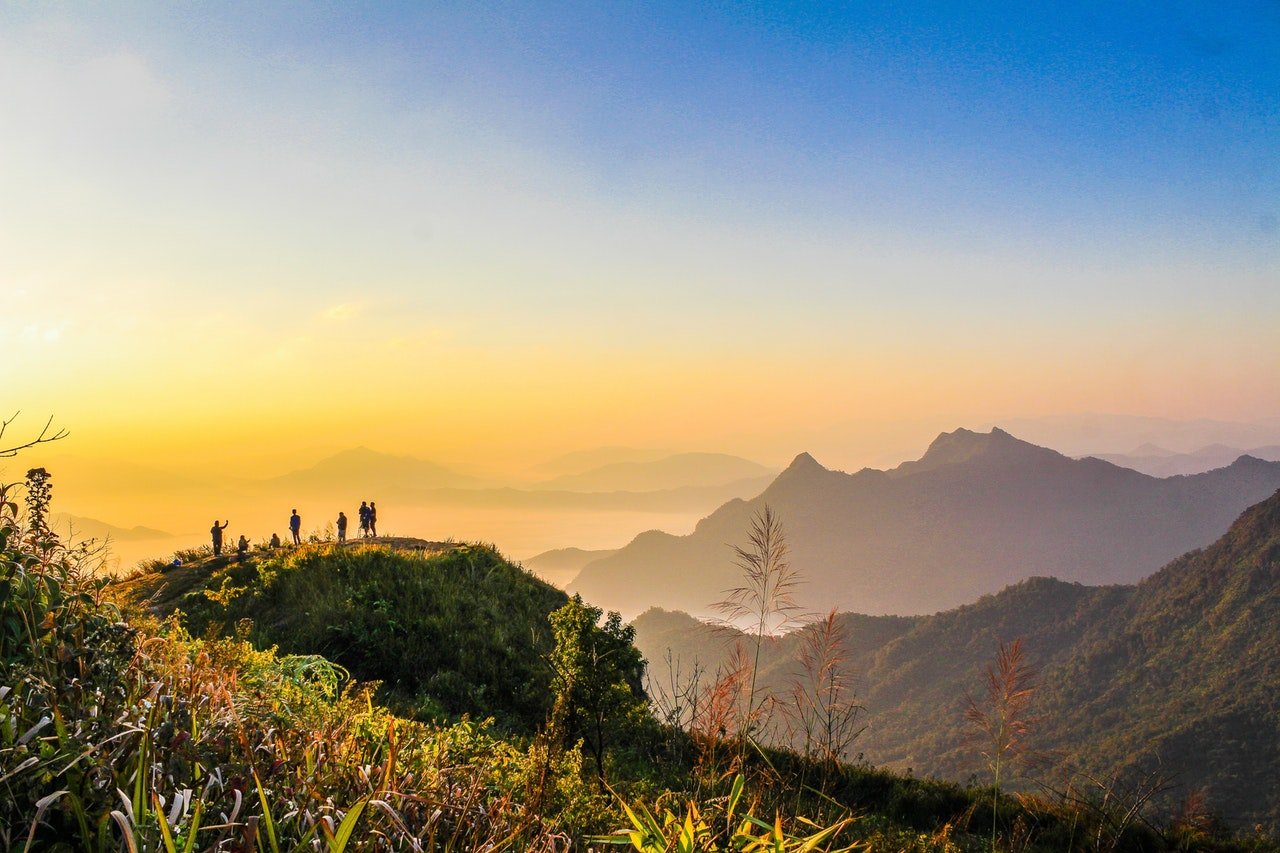 Services Photo Of People Standing On Top Of Mountain Near Grasses 733162 1